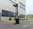 China Factory Self Loading Fork Lift Jack Pallet Stacker 1.5 Tons Electric Reach Pallet Lifter Warehouse Equipment